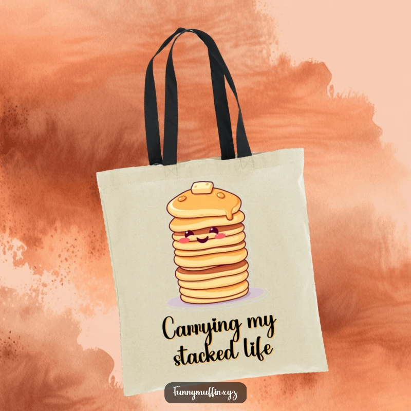 Funny tote bag with a smiling pancake character stacked high, tipping precariously, great for carrying essentials with a smile.